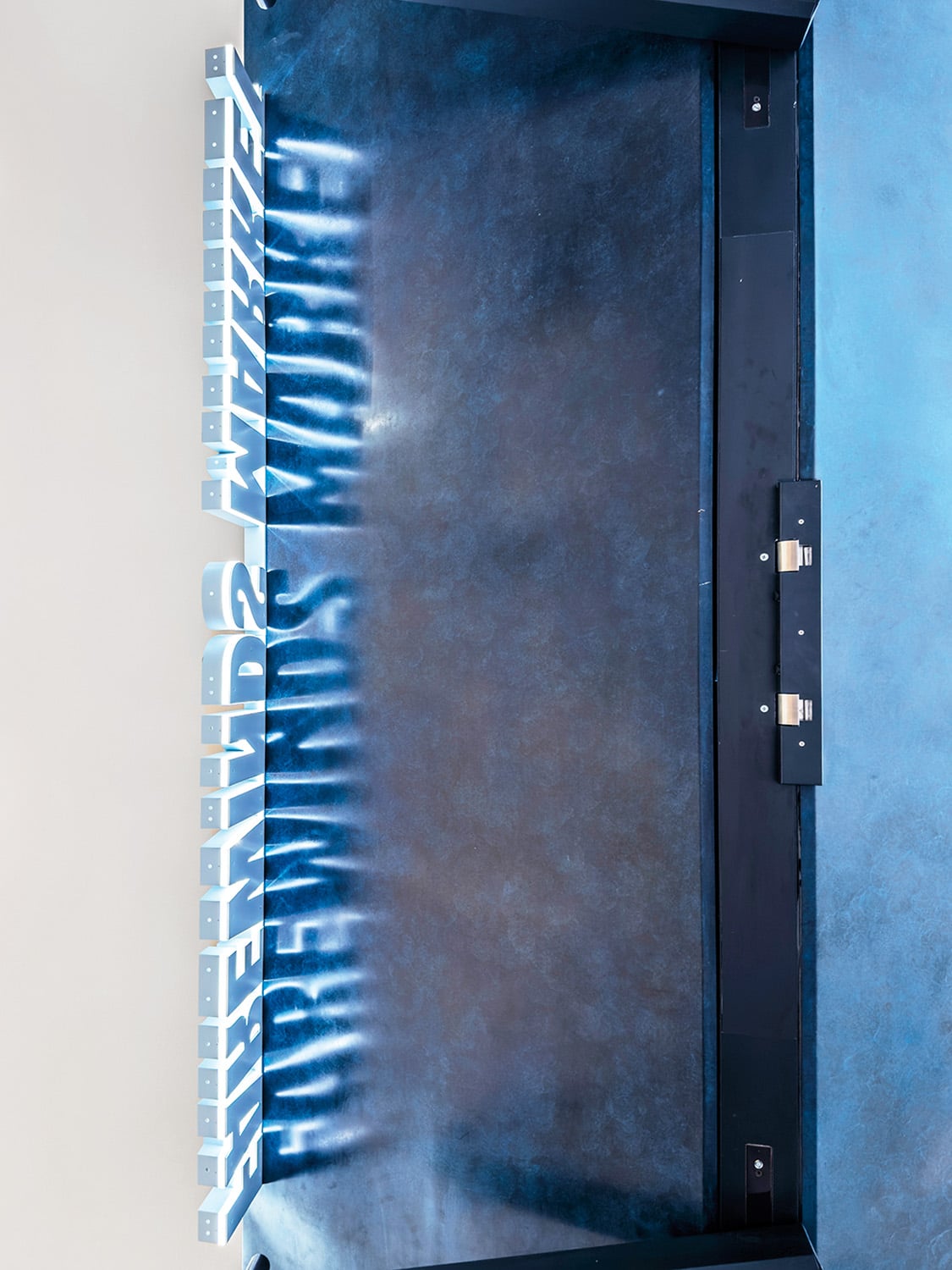 signage on bronze door