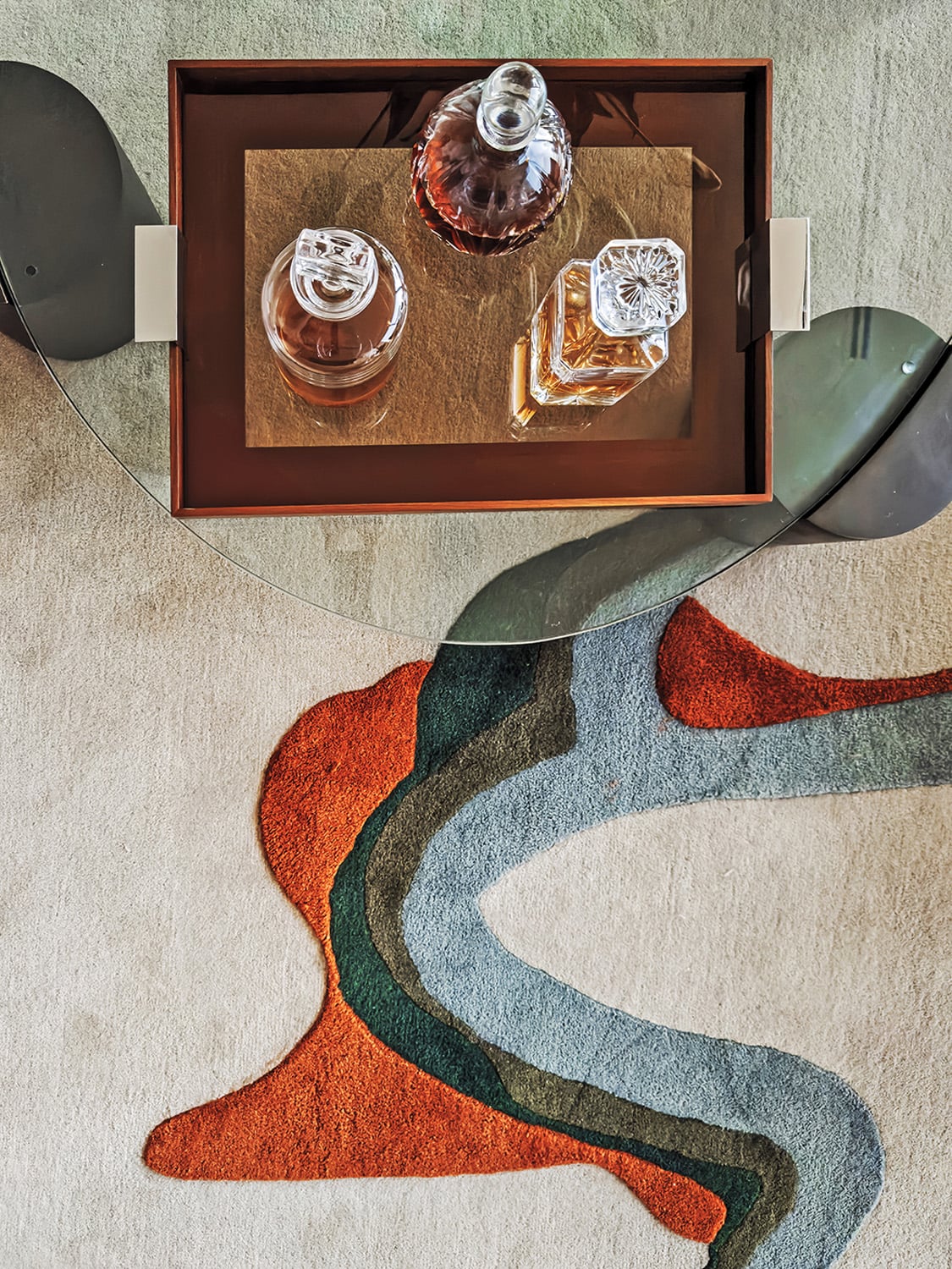 A custom rug anchors the 12th-floor sky lounge.