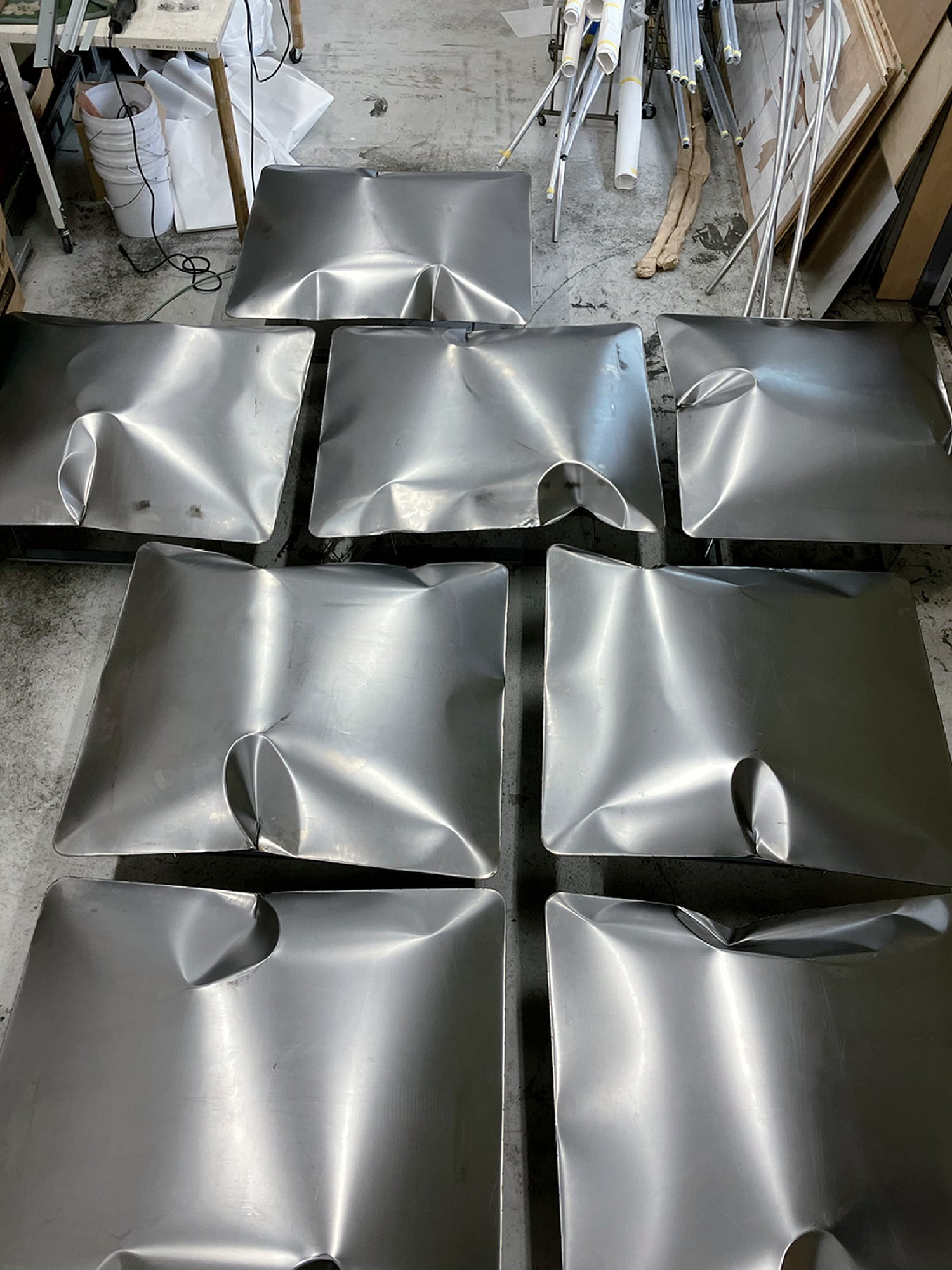 A bunch of metal pieces sitting on a table