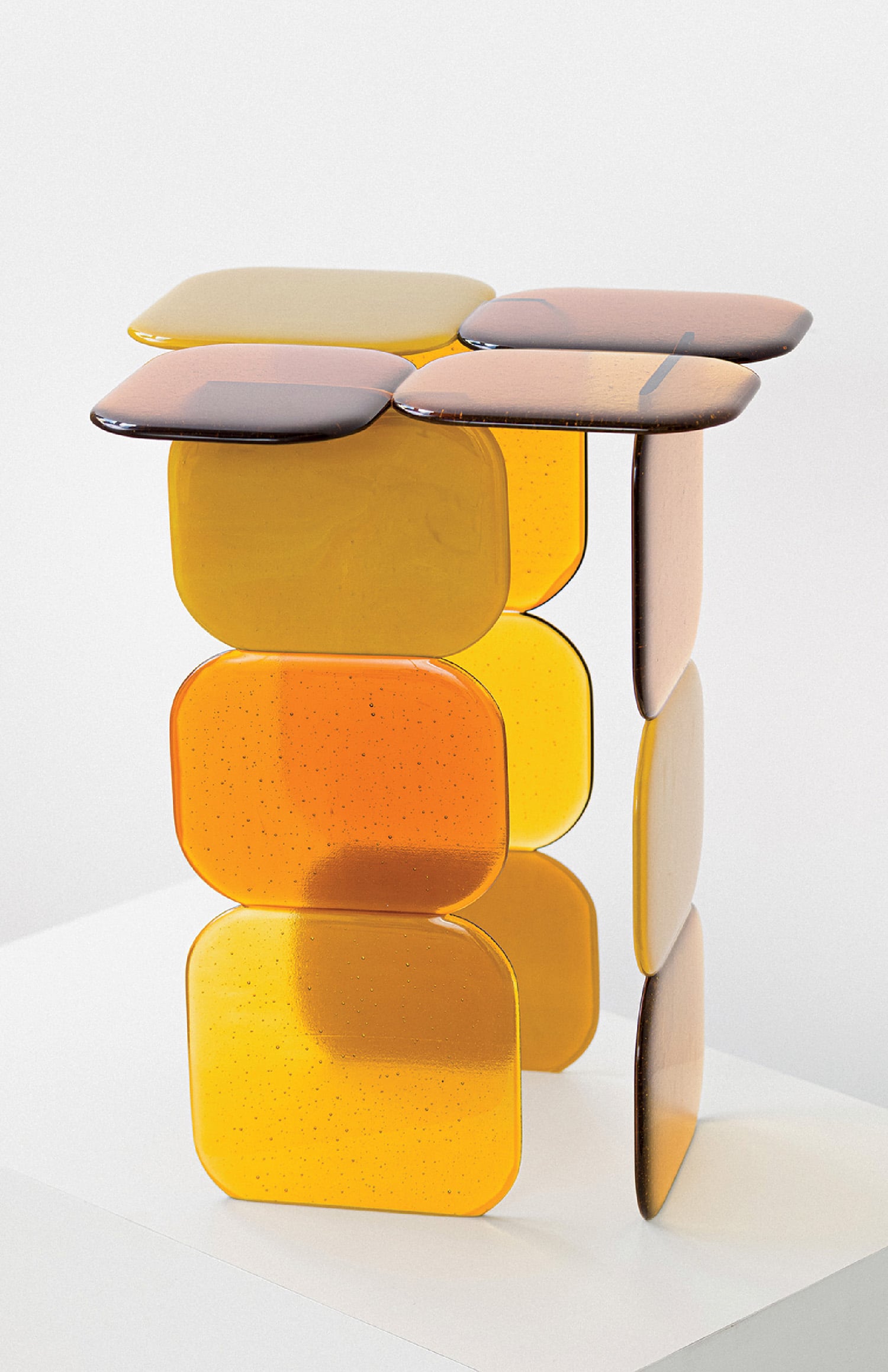 A table with a bunch of different colored objects on it