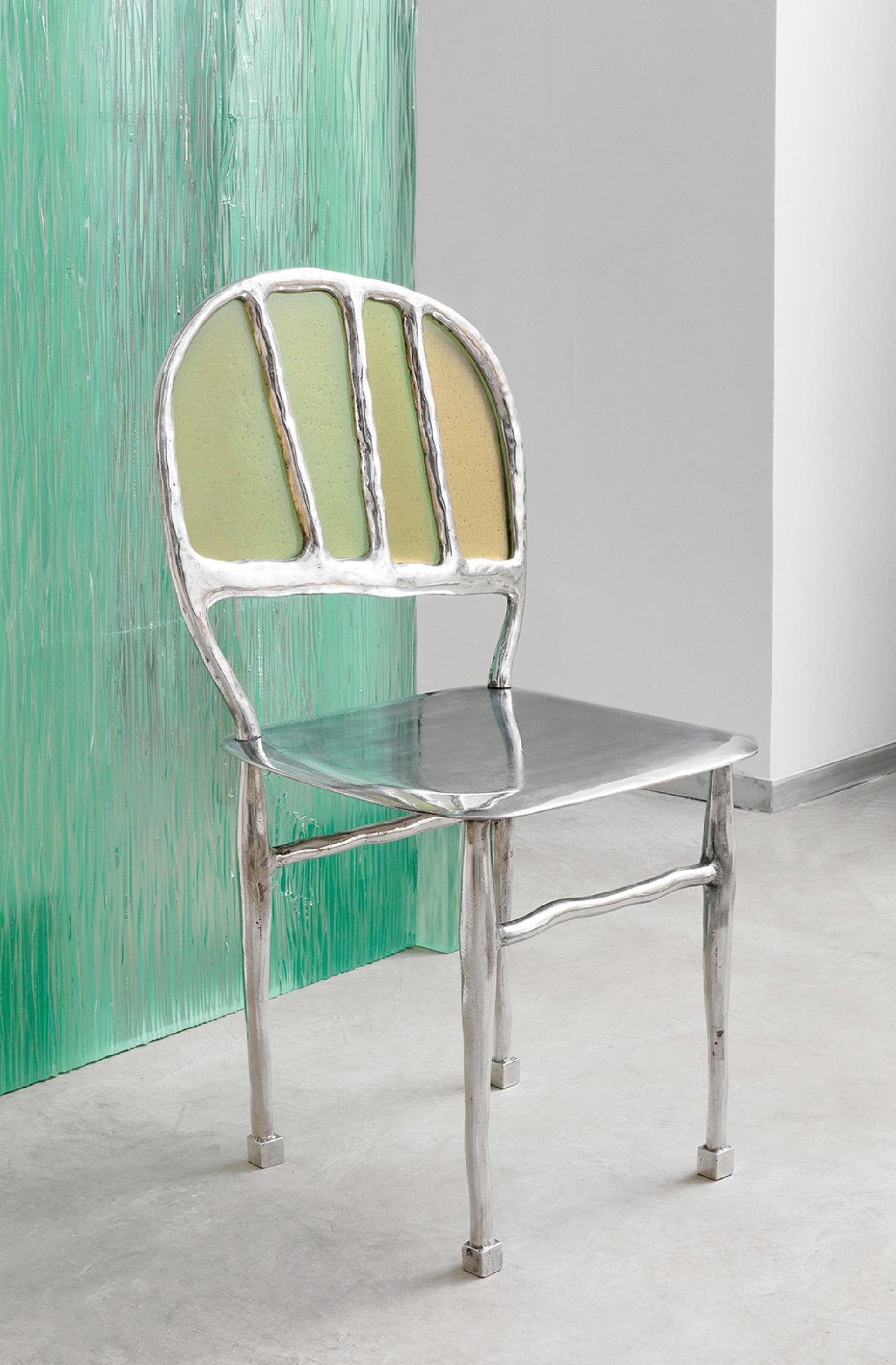 A chair with a green paint on it