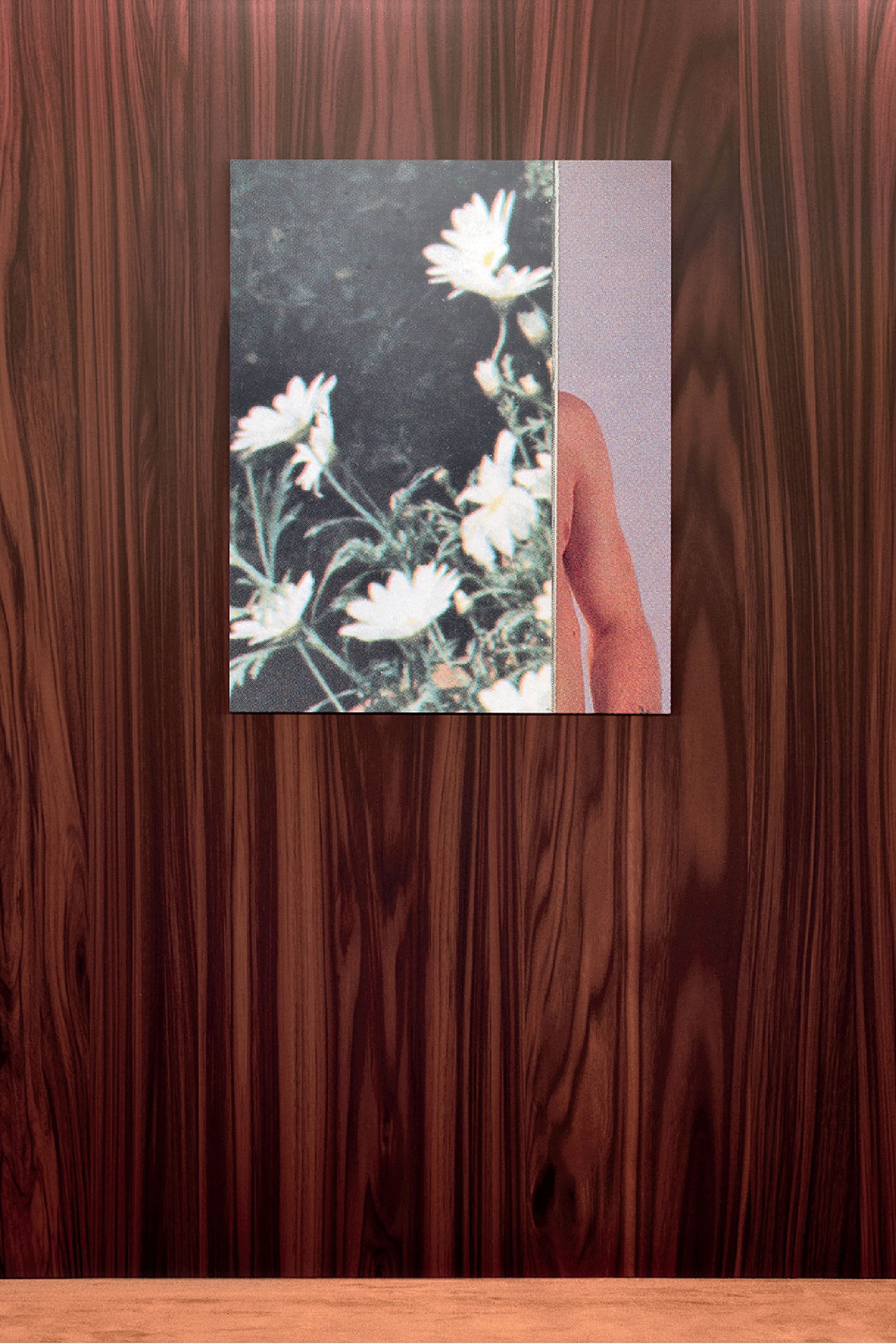 A picture of a woman with a flower in her hair.