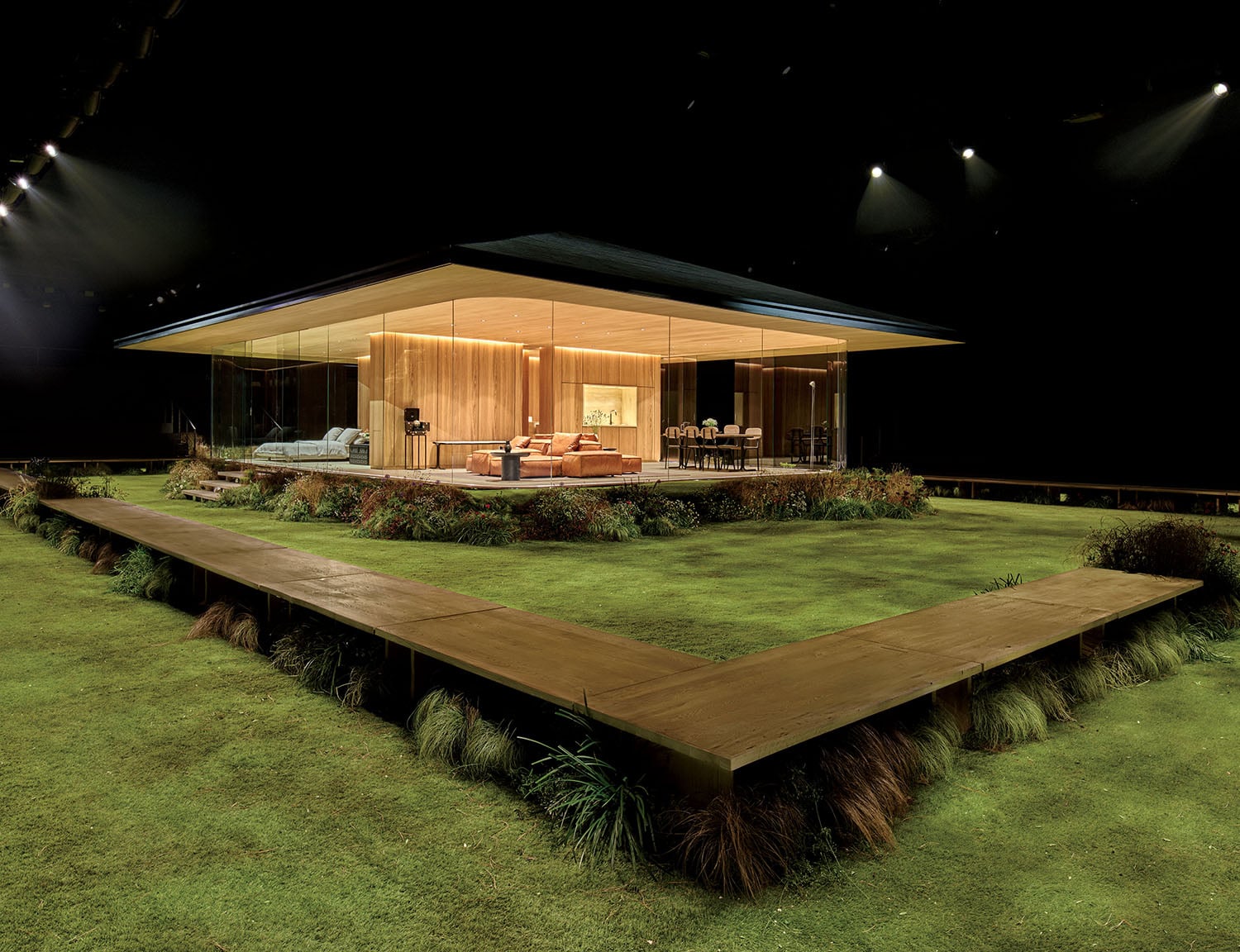 A house with a lawn and a patio.