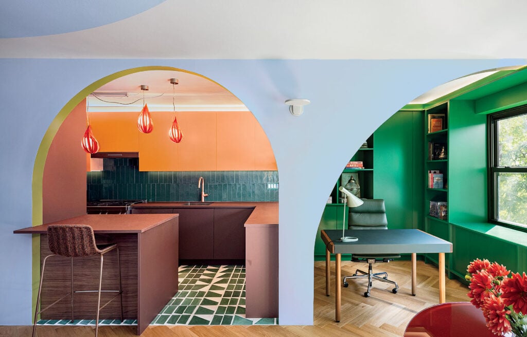 A room with a desk and a chair.
