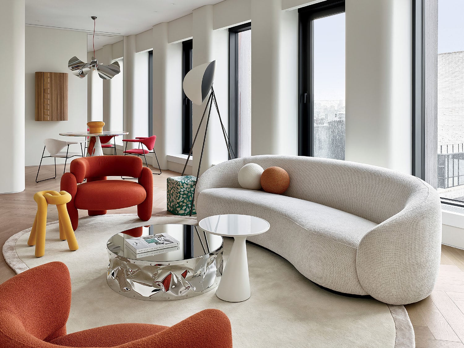 A living room with a couch, chair, and coffee table.