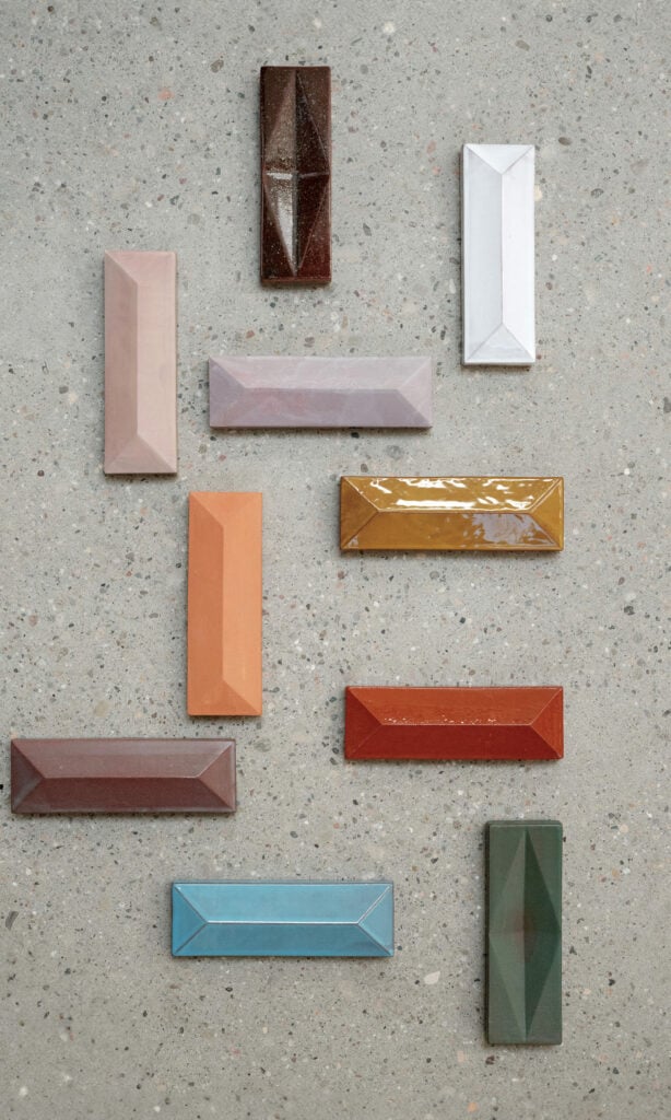 A group of different colored pieces of glass
