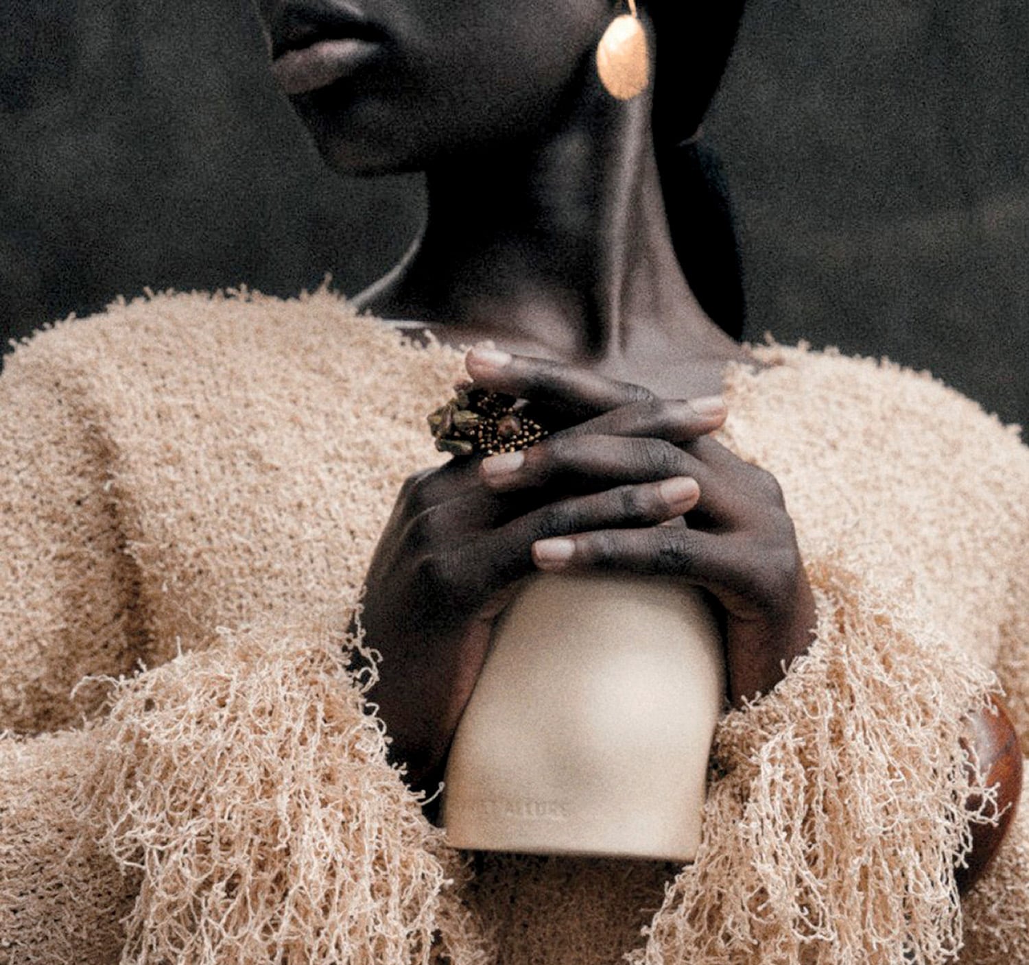 A woman with a candle in her hand