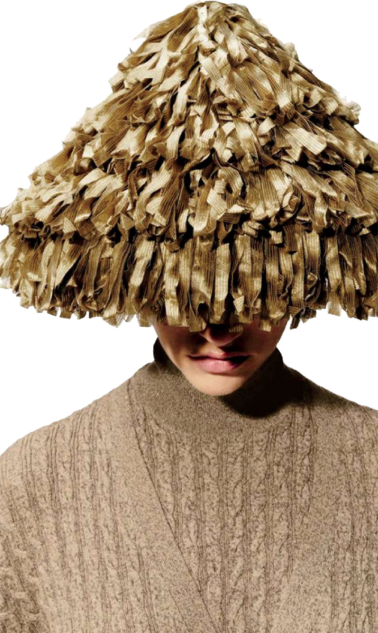 A woman wearing a hat made out of feathers