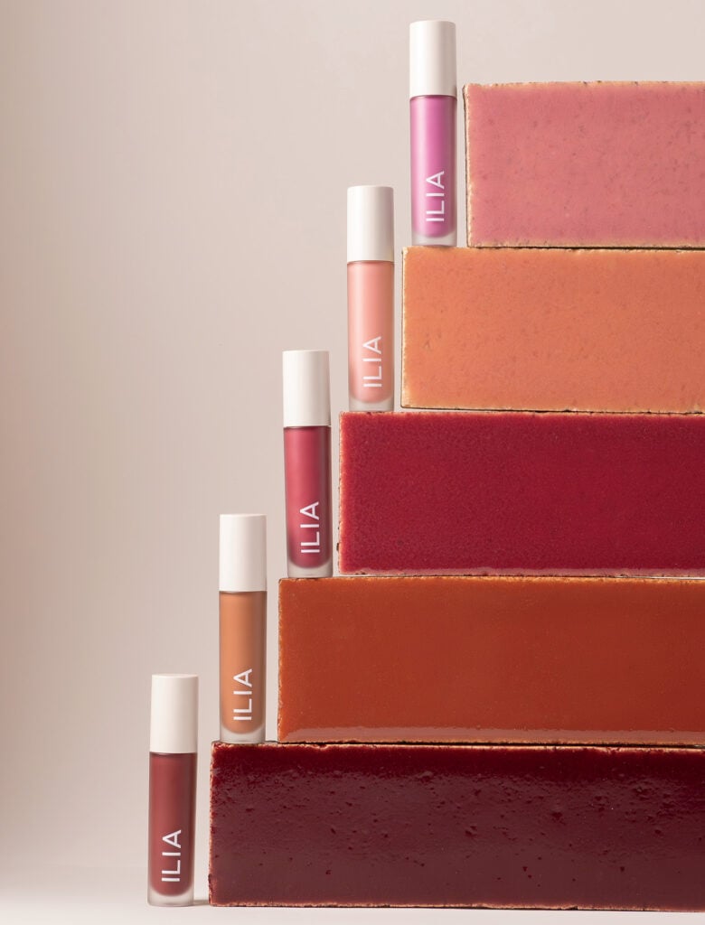 A stack of different shades of lipstick