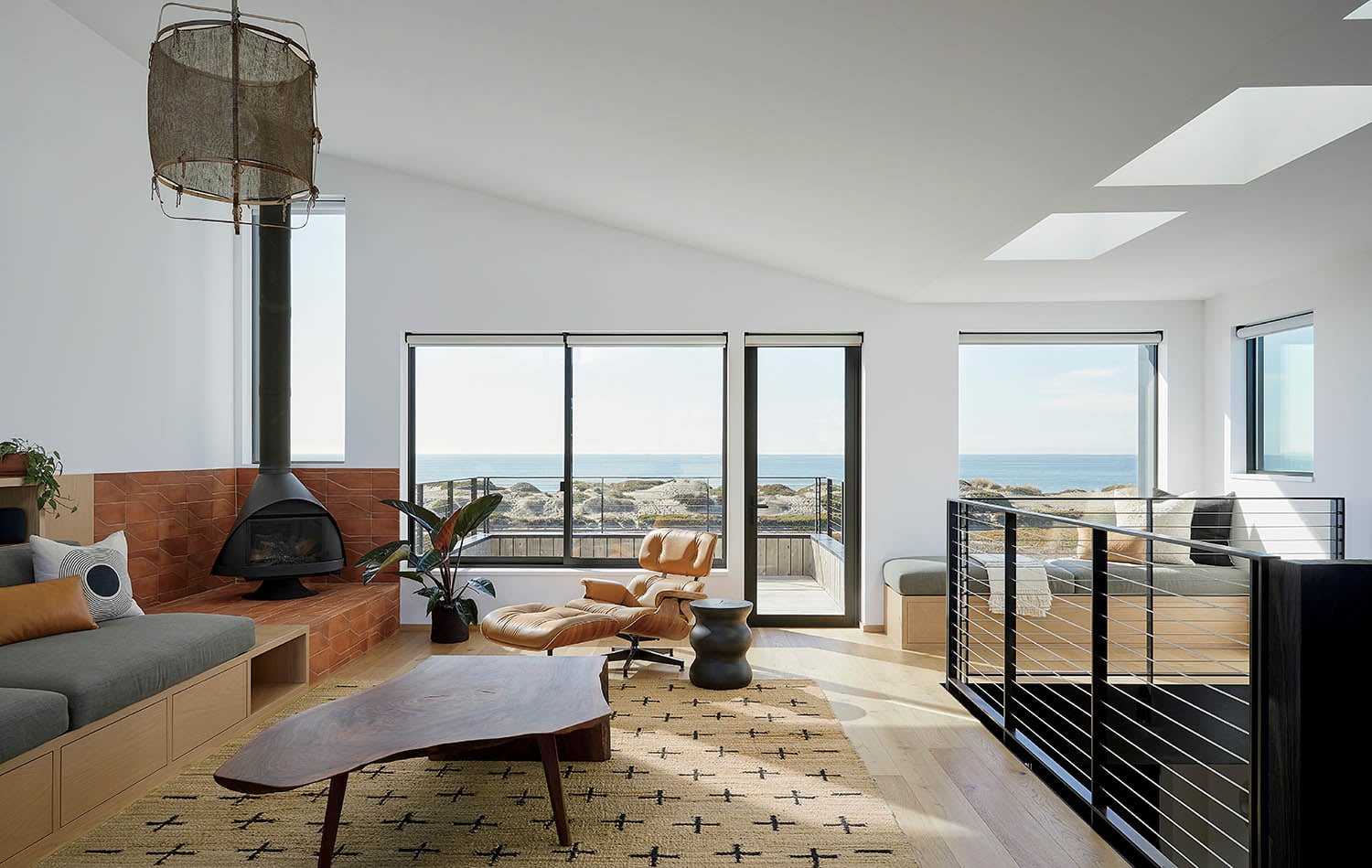 A living room with a couch and a fireplace.