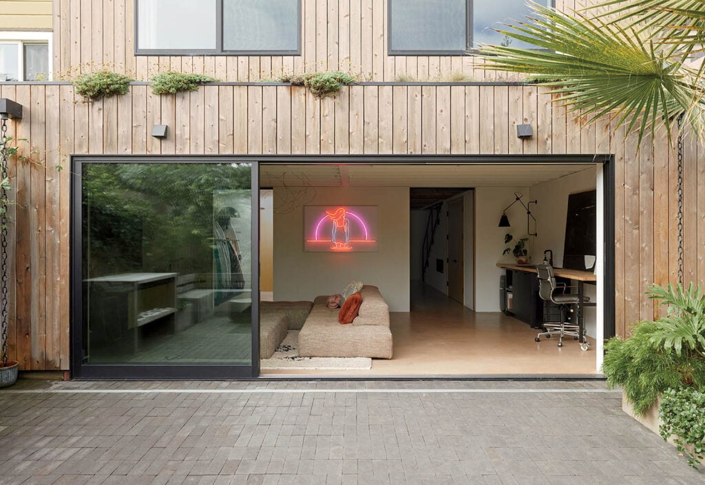 A patio with a couch and a table.