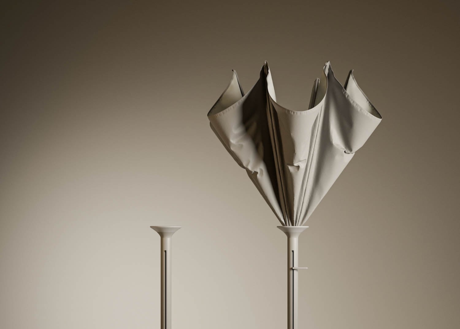 A closed beige umbrella stands upright next to a similar pole without an umbrella, both against a plain, neutral background.