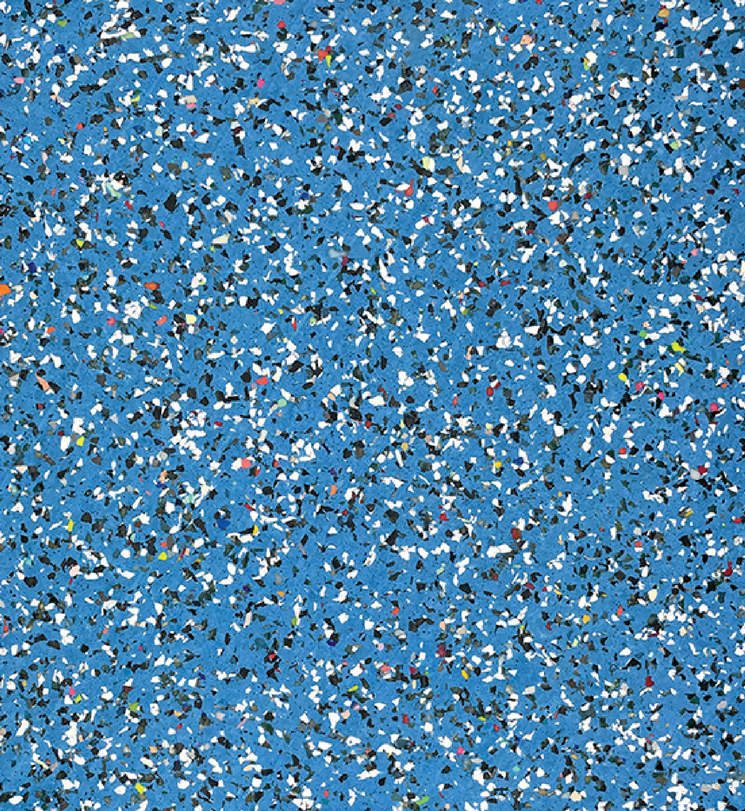 Blue speckled surface with scattered white, black, grey, and occasional red or yellow flecks, resembling a terrazzo or rubber flooring pattern.
