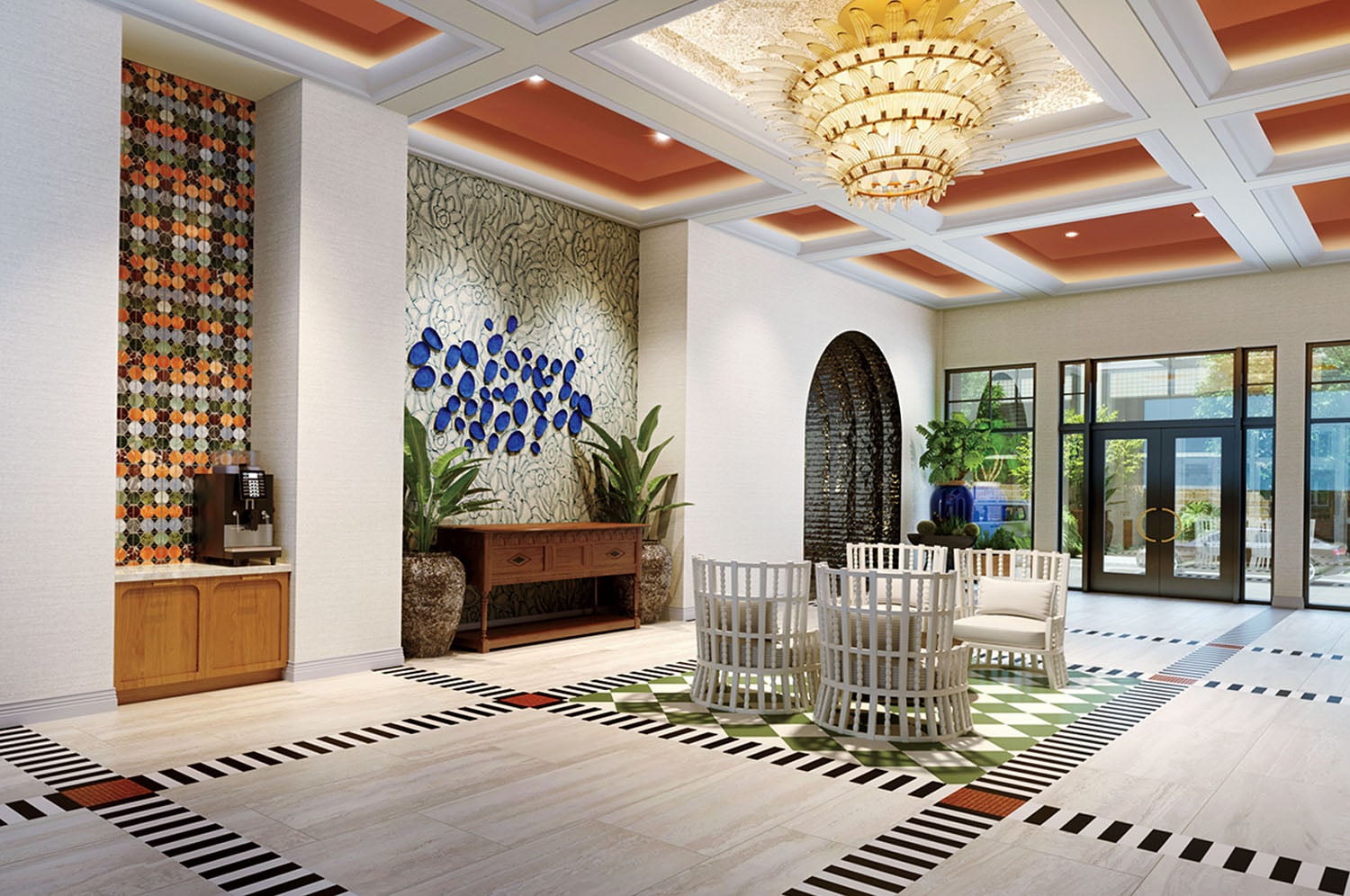 A living room with a large chandel and a baby crib.