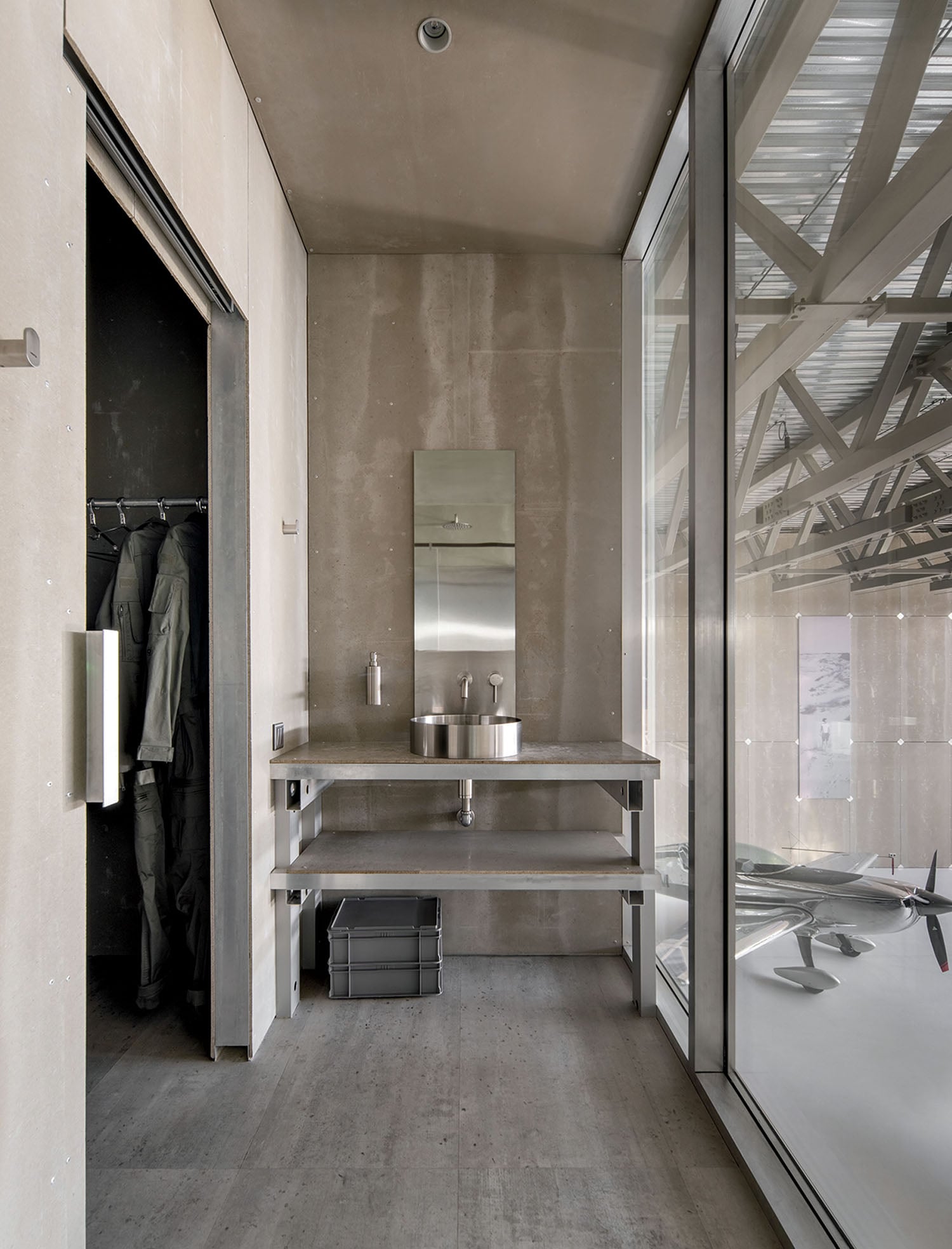 A bathroom with a sink and a mirror.