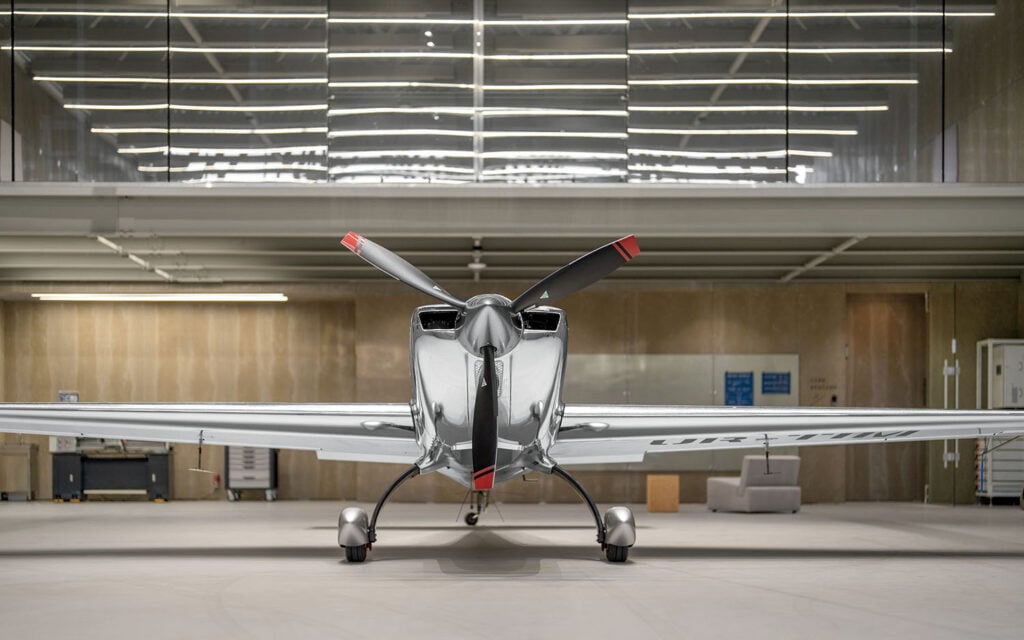 A small plane sitting in a building.