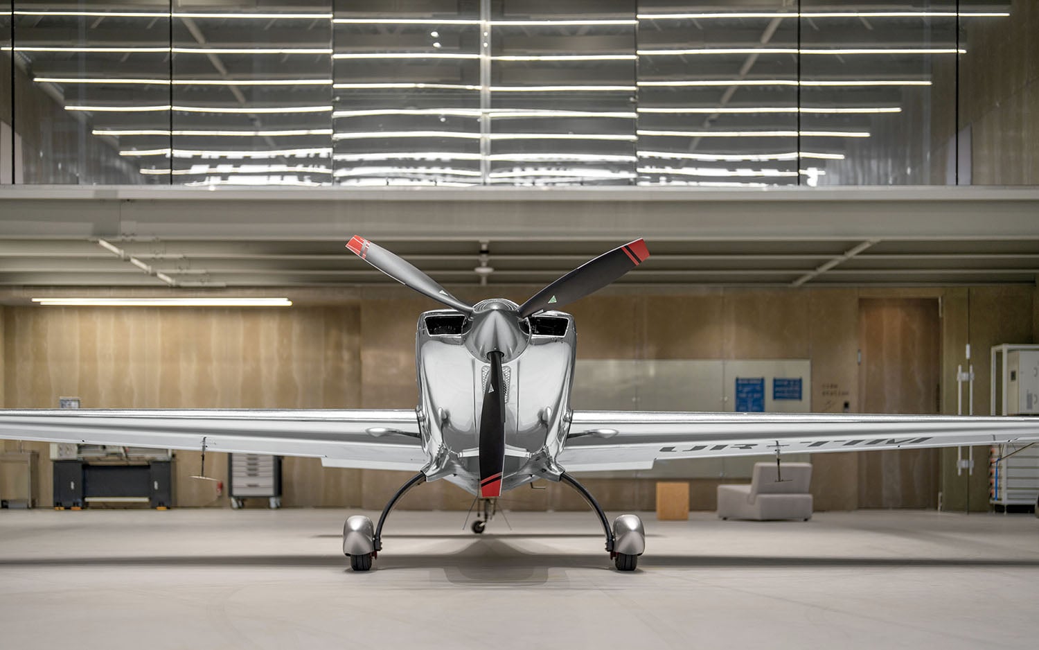 A small plane sitting in a building.