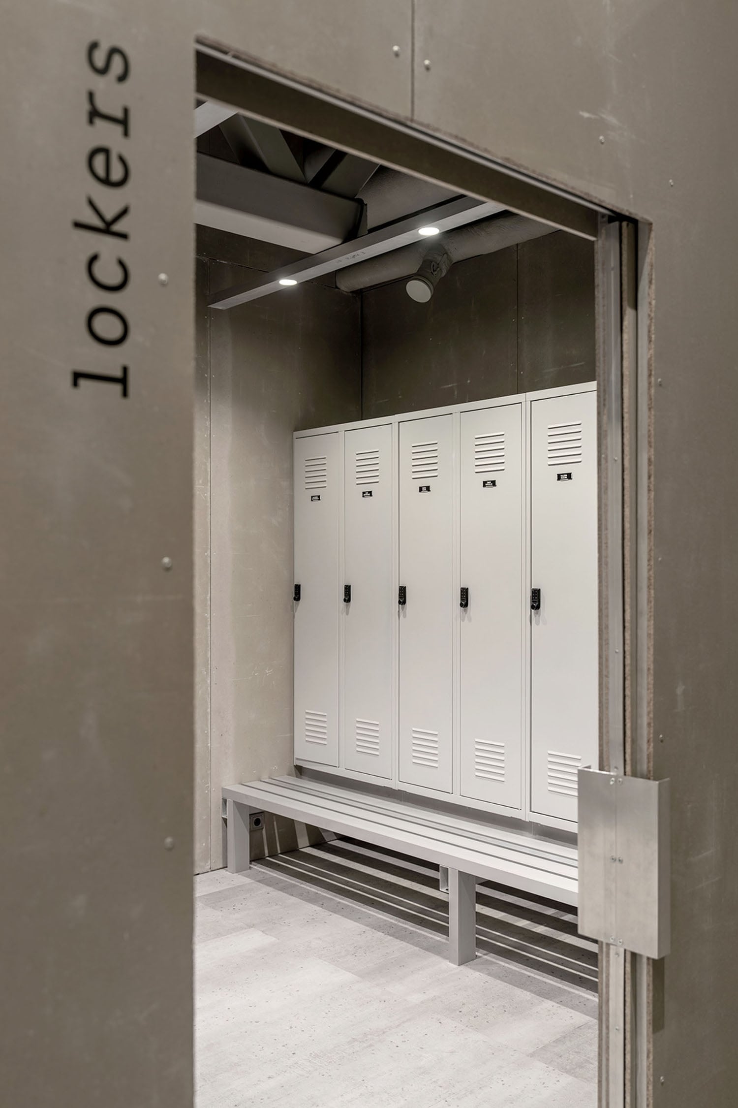 Lockers in a building with a sign that says ticket.