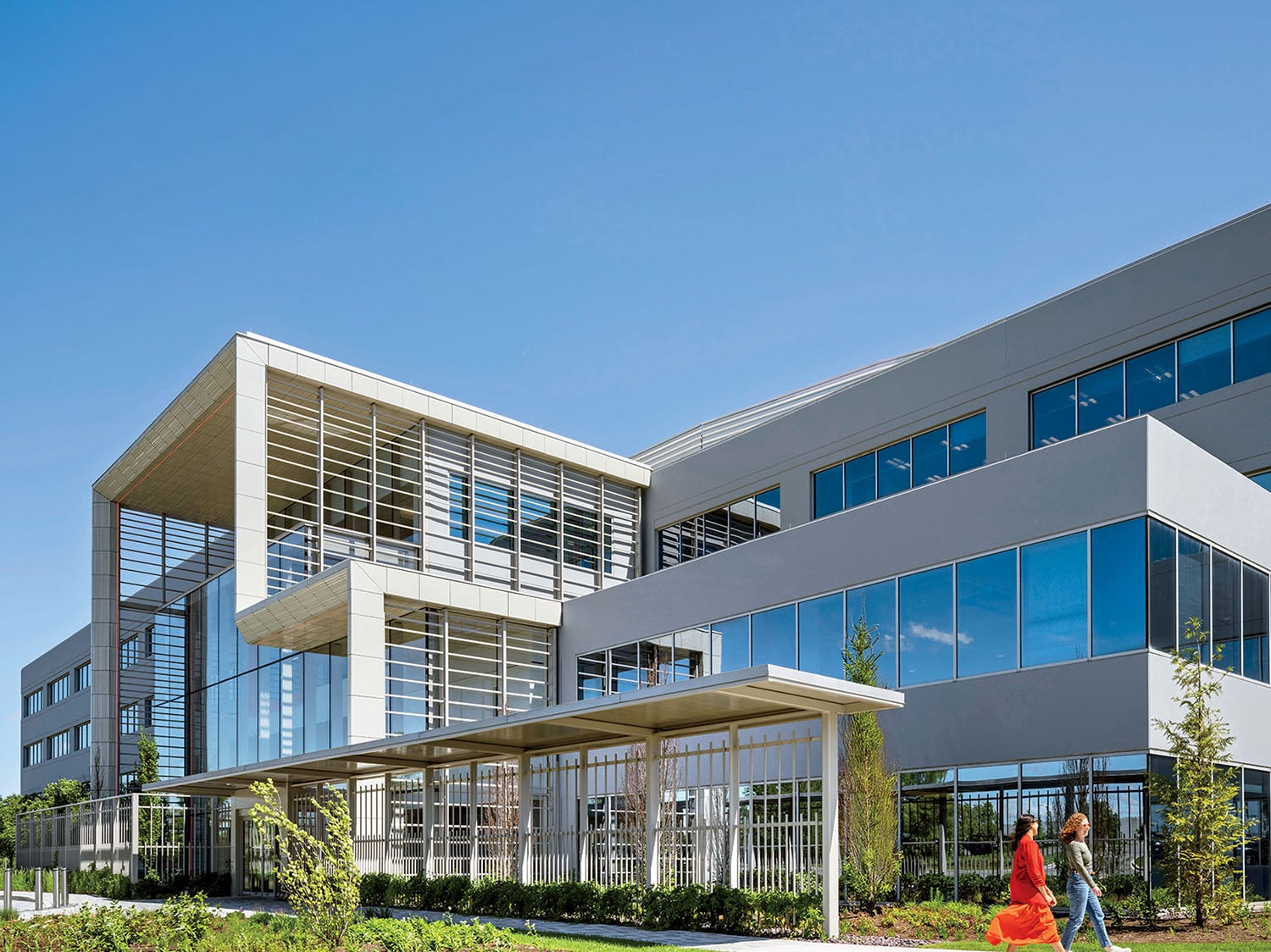 A large white building with many windows.