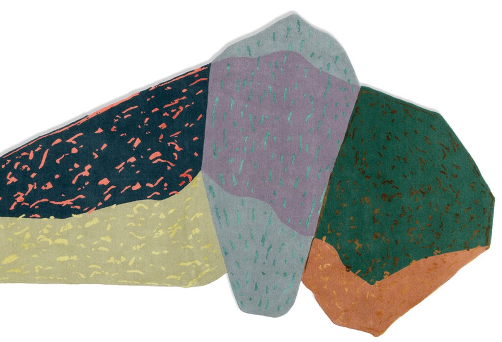 Abstract, irregular shapes in green, purple, yellow, orange, and dark blue with scattered colorful patterns, resembling overlapping stones or geological forms.