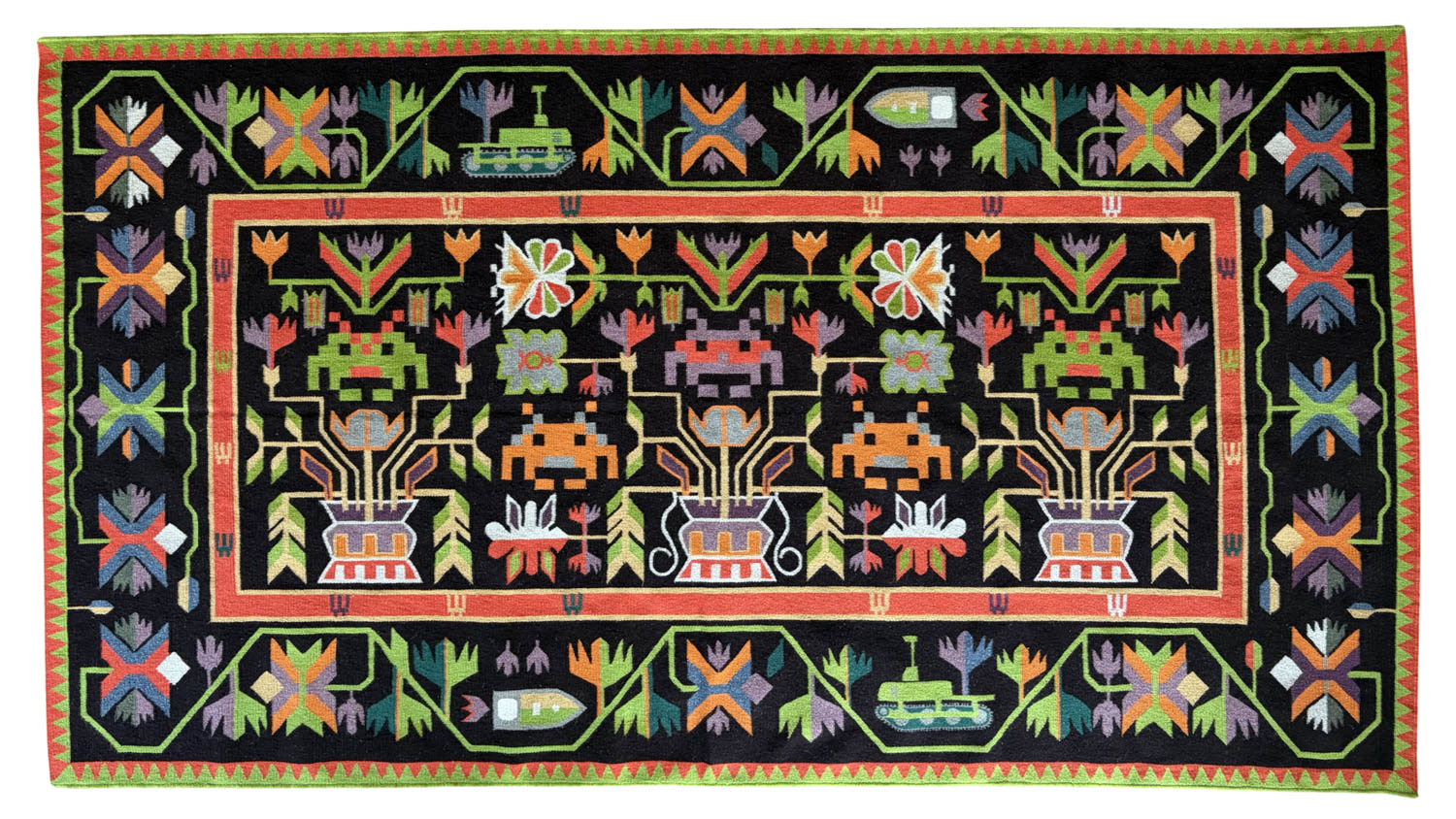 Rectangular woven rug with a black background, featuring colorful geometric floral and vase patterns in red, green, orange, purple, yellow, and blue, bordered by repeating motifs.