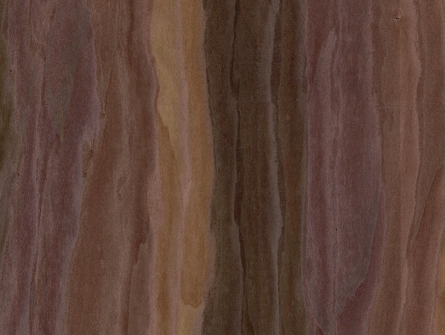 Close-up of a surface with a natural, multicolored wood grain pattern featuring brown, tan, and reddish hues in vertical, wavy lines.