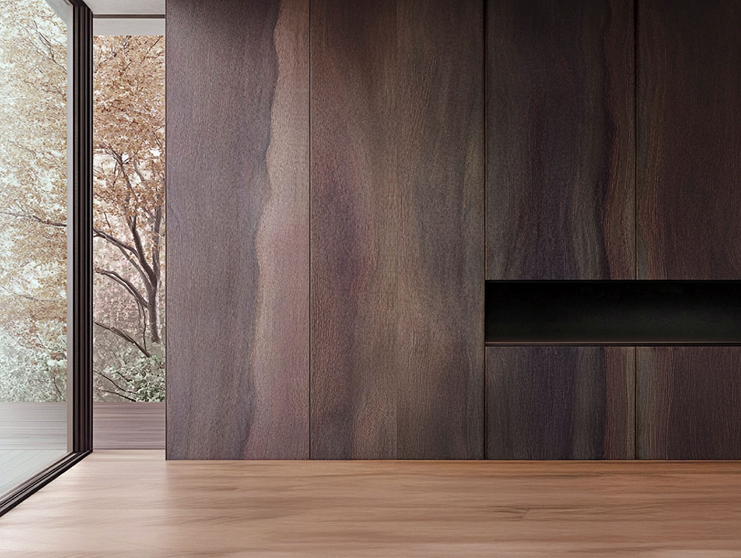 A modern interior with dark wood paneling, a built-in niche, light wood flooring, and a large glass door opening to trees outside.