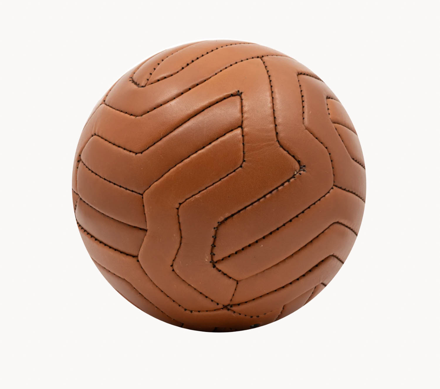 A brown leather ball with black stitching in a zigzag pattern is shown against a plain white background.