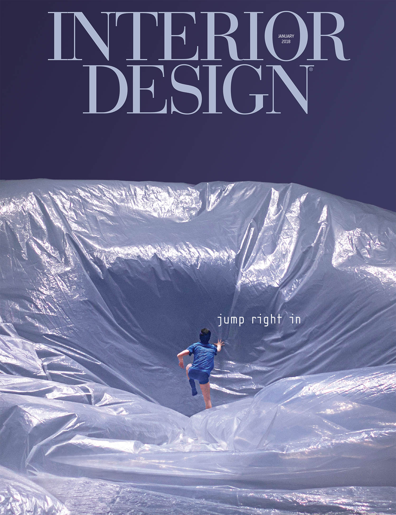 A person in blue steps onto a large silver tarp with “INTERIOR DESIGN” and “jump right in” text above.