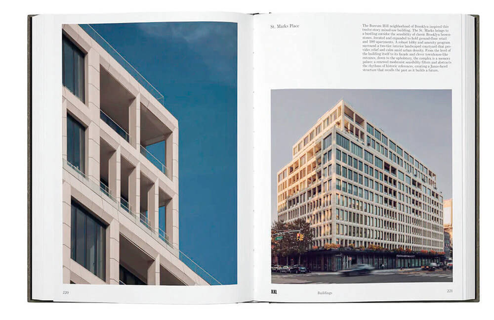 Open book displaying architectural photographs of a modern, multi-story building with geometric patterns and large windows against a clear sky.