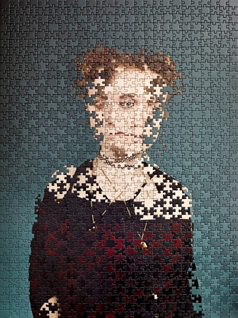 A partially completed puzzle shows a woman with curly hair against a teal background; her face and upper body are missing several pieces.