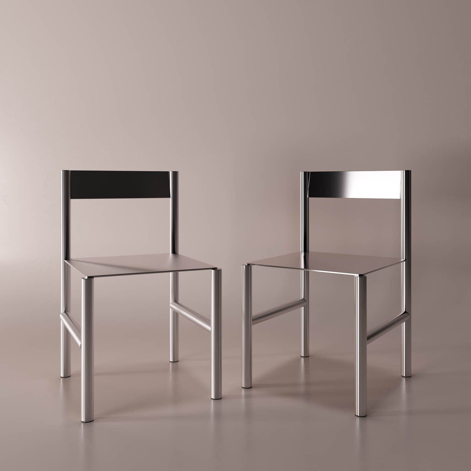 Two metallic chairs with minimalist, angular designs are placed on a smooth surface against a plain, beige background.