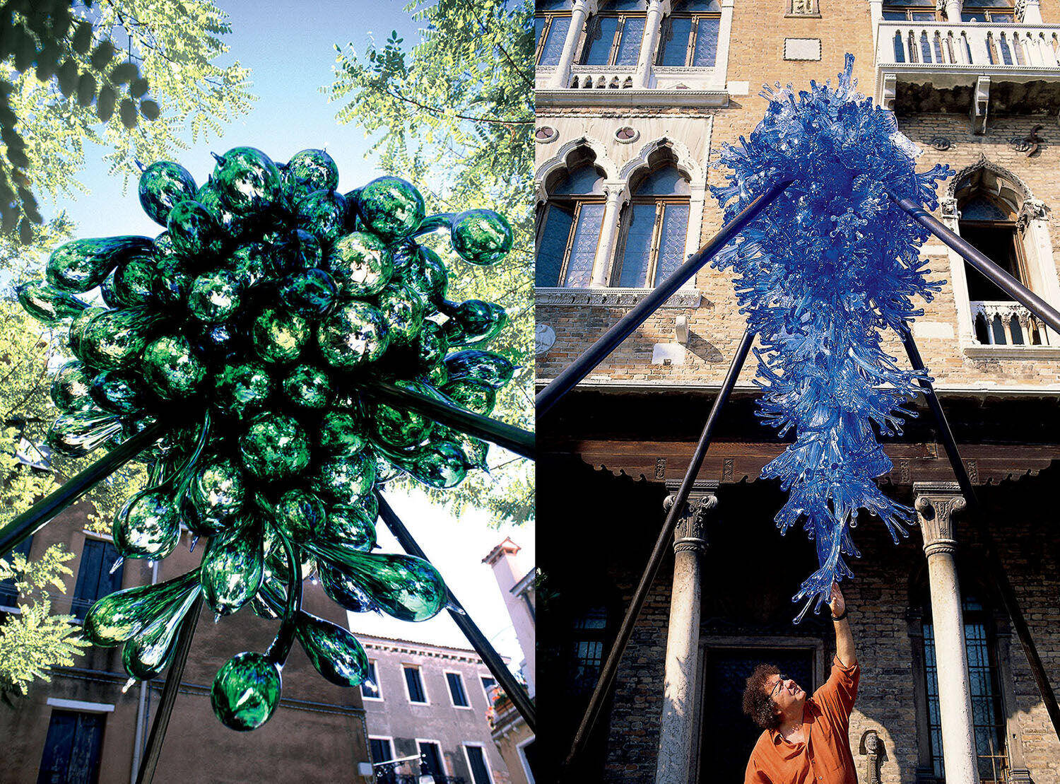 Two large, intricate glass sculptures—one green and one blue—are displayed outdoors; a person stands beneath the blue sculpture, gesturing toward it.