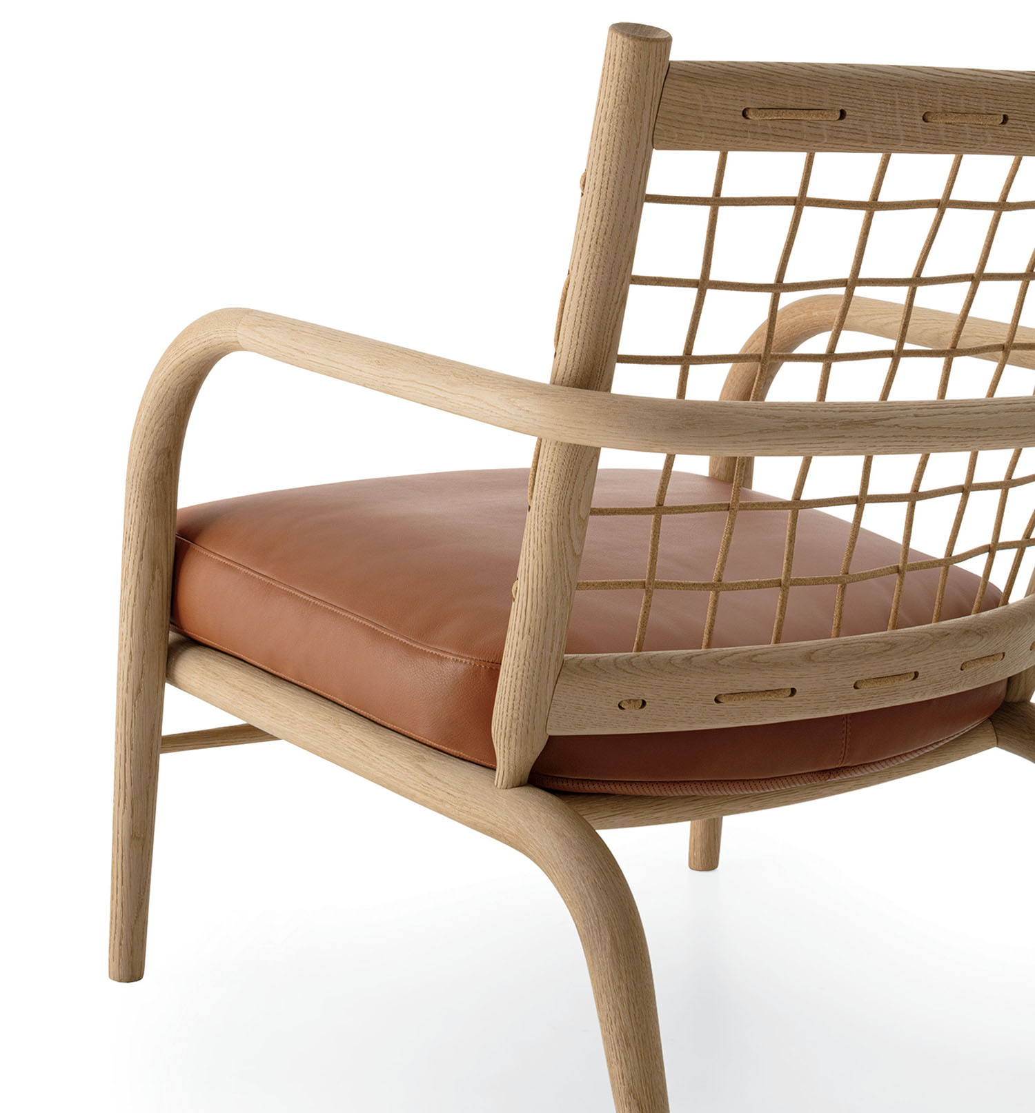 Wooden armchair with a grid-patterned backrest and a brown leather seat cushion, shown against a white background.