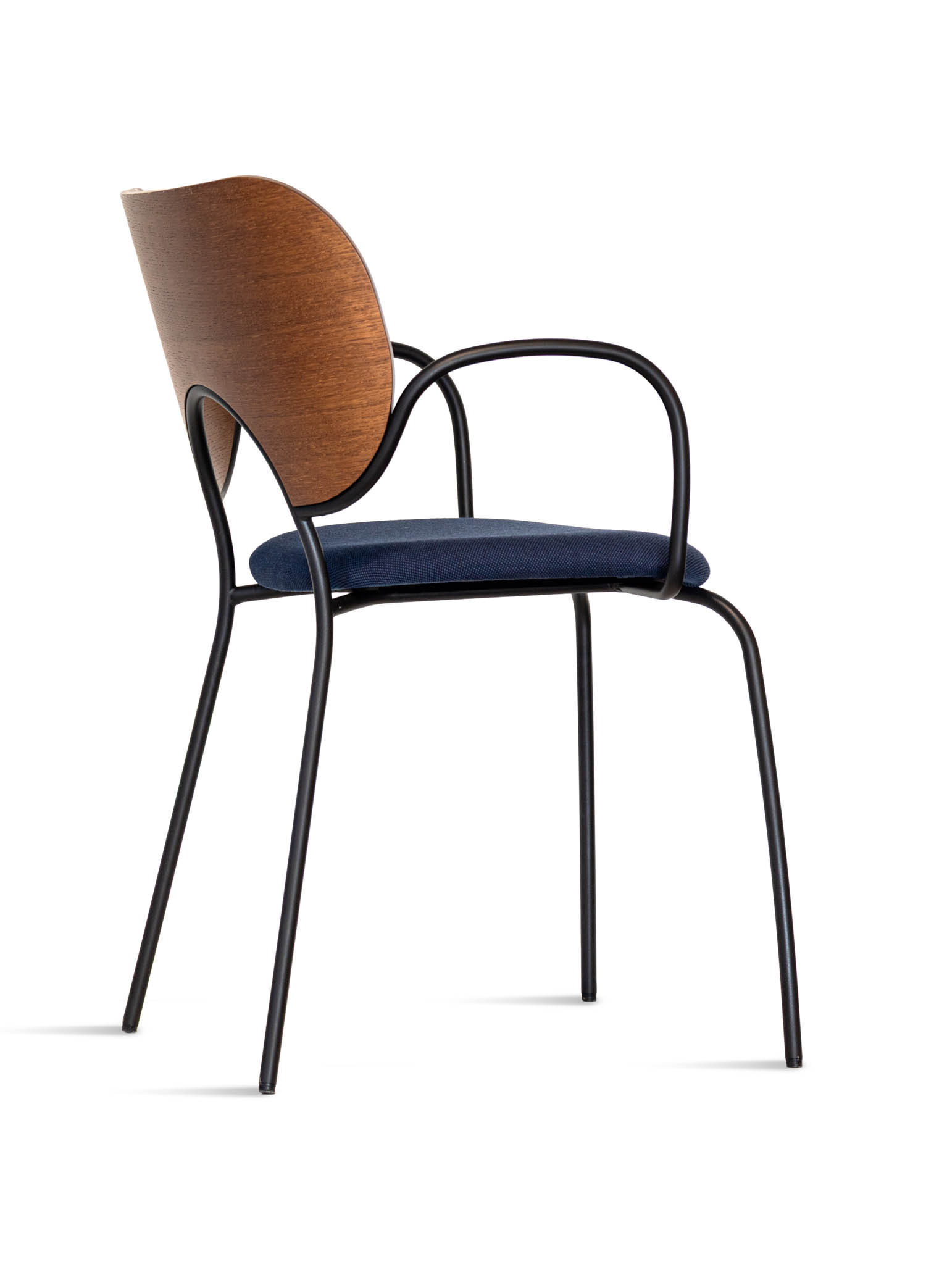 Modern chair with a curved wooden backrest, navy blue cushioned seat, and slim black metal legs and armrests, viewed from an angle.